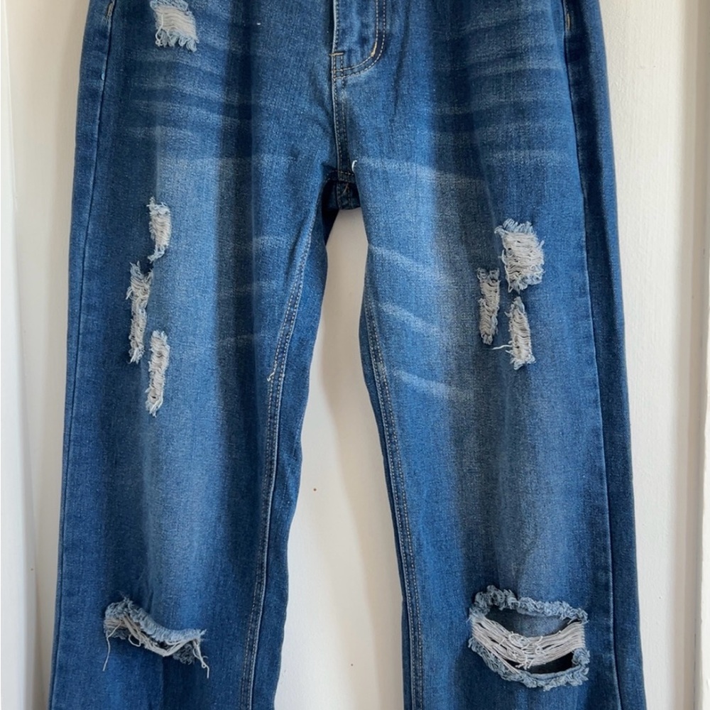 Distressed Blue Jeans